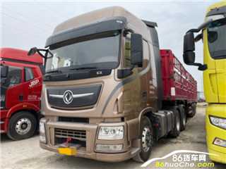 泸州二手东风商用车 天龙旗舰 牵引车带13米高栏挂